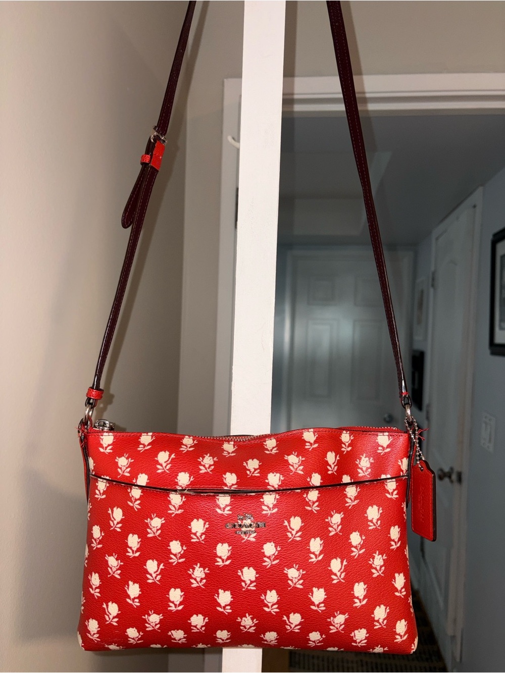 COACH EAST/WEST BADLANDS
FLORAL PRINT in GUC